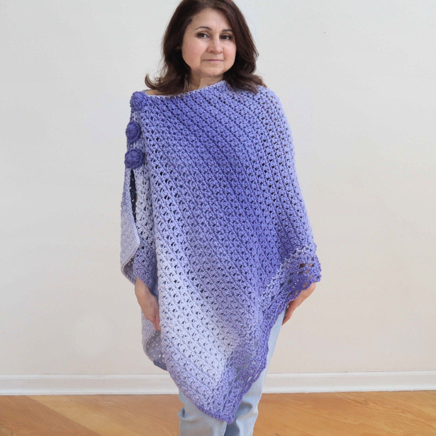 39 Crochet Button Patterns and Projects That Show Them Off 28 Crochet Poncho Pattern. Asymmetrical Poncho with Buttons.