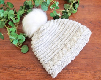 Crochet CABLE Hat PATTERN uses a super EASY crochet cable stitch! Crochet cable hat for women with fur pom pom.