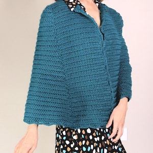 Crochet CAPE PATTERN using a design combination of a crochet CARDIGAN and crochet cape. Updated look with trendy styling. Unique border!