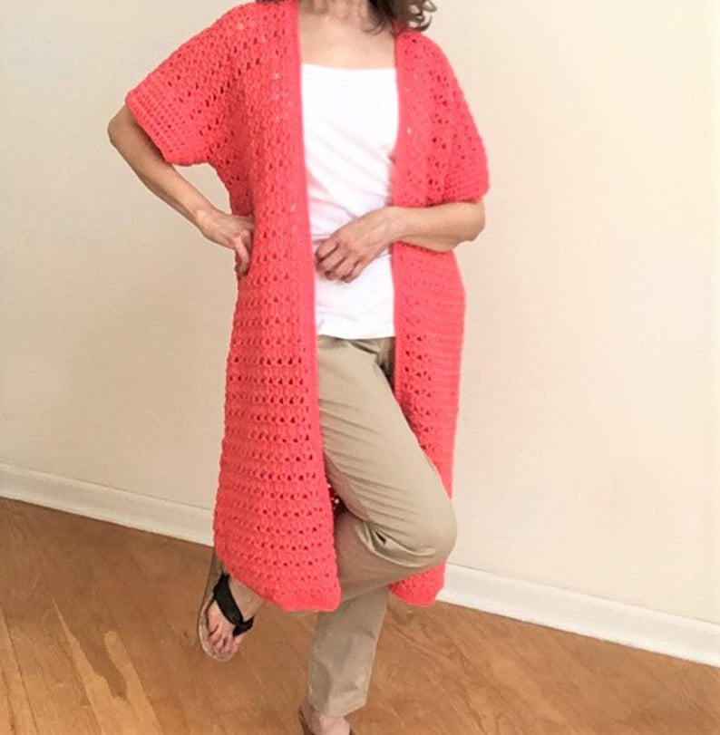 Crochet pattern for a long cardigan duster. Perfect for spring and summer. Lightweight sport yarn. Easy crochet for beginner. Crochet pattern for a long cardigan duster. Perfect for spring and summer. Lightweight sport yarn. Easy crochet for beginner.