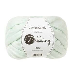 May include: A ball of light green, 100% recycled cotton yarn called "Cotton Candy" in the color "Milky Green" by Bobbiny. The yarn is approximately 150 grams.