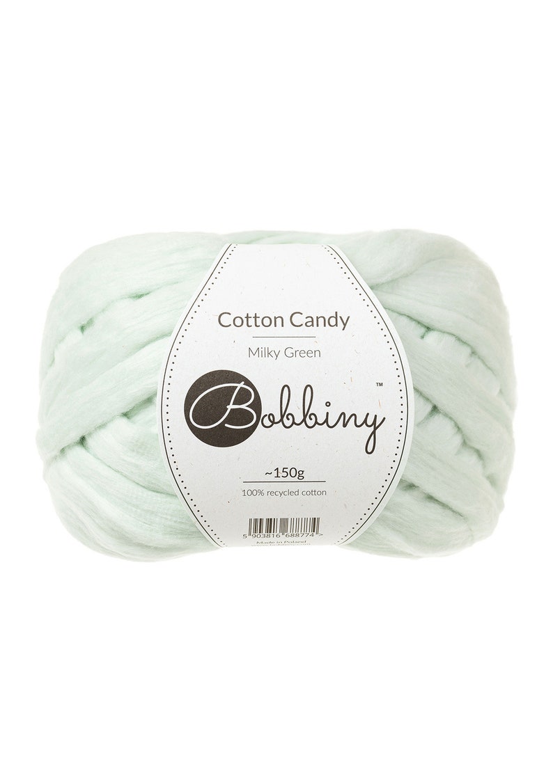 May include: A ball of light green, 100% recycled cotton yarn called "Cotton Candy" in the color "Milky Green" by Bobbiny. The yarn is approximately 150 grams.