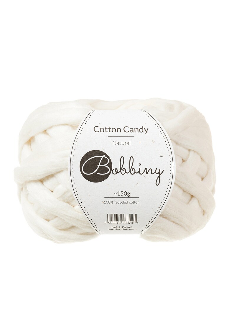 May include: A white ball of Cotton Candy yarn by Bobbiny, made from 100% recycled cotton. The label says "~150g" and "Natural".