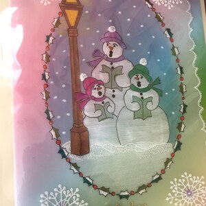 Biglietto di Natale con pupazzi di neve