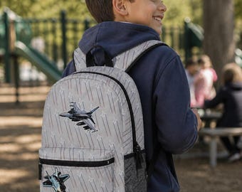 Cadeau personnalisé pour enfants | Sac à dos à motif avion de chasse | Fournitures scolaires | Pilote | Avions de dessin animé