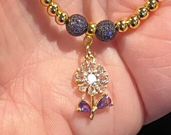 Bracelet fleur rempli d'or : boule disco mauve, marguerite zircone cubique