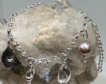 Sterling Silver Seashell Charm Bracelet: Freshwater Pearl CZ Accents