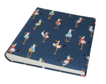 Children&#39;s photo album Adebar in cotton fabric cover