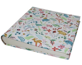 Children&#39;s photo album Forest in a cotton fabric cover