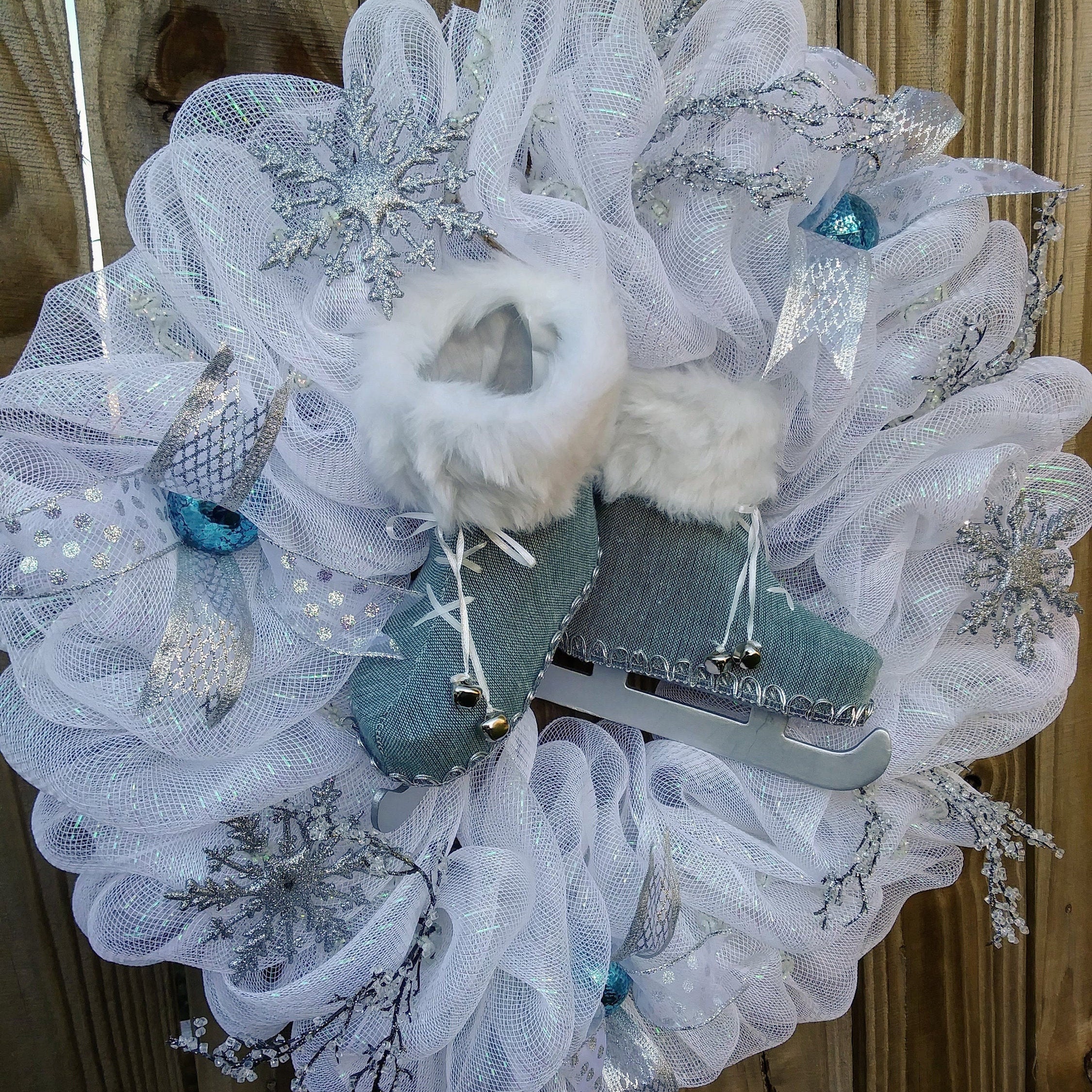 Ice Skates on White Wreath. Snowflake and Icicle Wreath. Blue Skates on