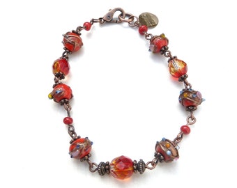 Czech brocante copper-colored bracelet, equipped with handmade Czech glass beads in various shades of red