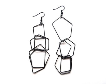 Asymmetrical lightweight black metal earrings in quadrilateral and pentagonal ornaments
