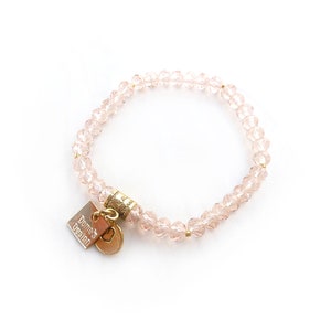 Elastische armband met roze glaskralen S-729a Bild 4