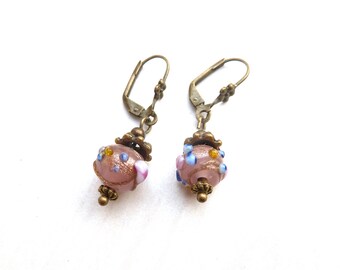 Bronze-colored earrings in a brocante style, with handmade pink Czech glass beads