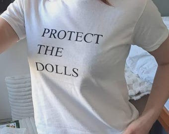 Protect The Dolls T-Shirt - Cropped Fit Baby Tee - Trans Rights Are Human Rights Tee - Screen Printed - LGBTQ+ Pride Shirt - Empowerment