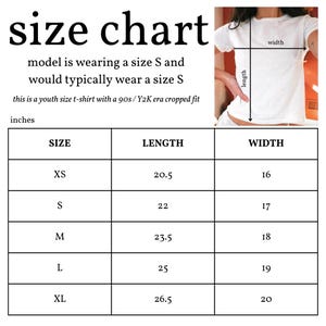 May include: Size chart for a youth t-shirt with measurements in inches for XS, S, M, L, and XL sizes. The chart shows the length and width of the shirt in inches.