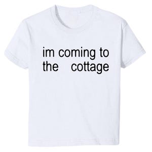 I’m Coming To The Cottage Cropped Baby Tee – Heated Rivalry Quote Cropped Shirt, Hockey Romance LGBT Fan Gift - Heavyweight Cotton T-Shirt
