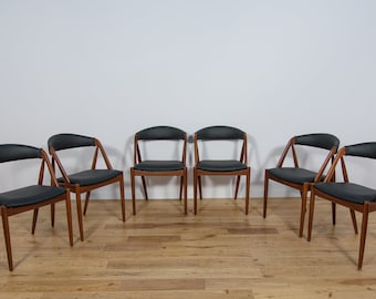 Juego de seis sillas, modelo 31, diseñadas por K. Kristiansen, Schou Andersen, Dinamarca, años 60.