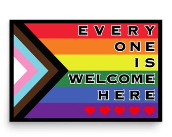 May include: A rainbow pride flag with a black, brown, light blue, and pink triangle in the corner. The text "EVERYONE IS WELCOME HERE" is written in black letters on the flag. There are five red hearts at the bottom of the flag.