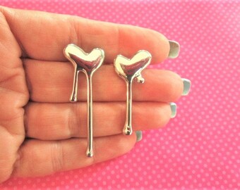 Dripping heart silver earrings