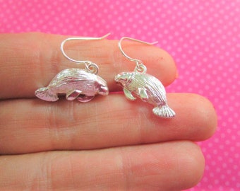 Manatee silver earrings