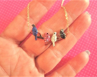 Crystal bird on branch necklace