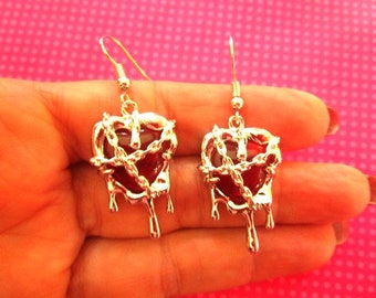 Chained heart drip earrings