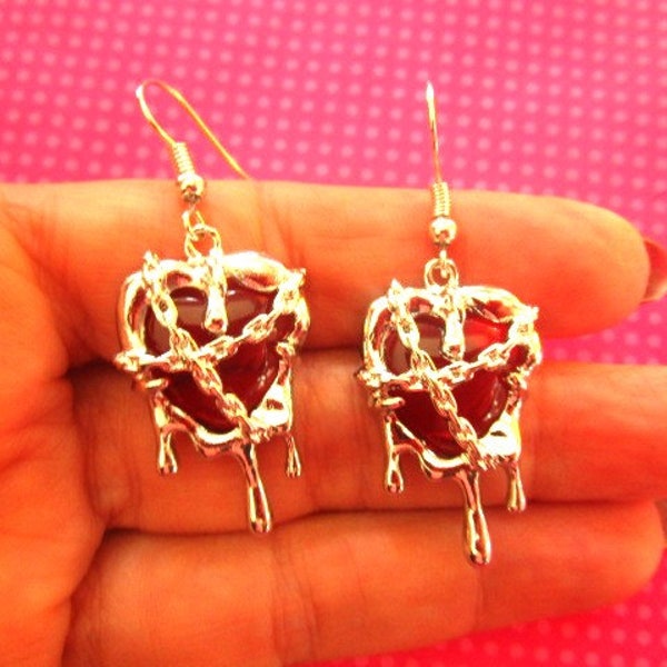 Chained heart drip earrings
