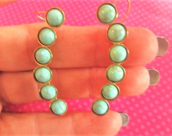 Turquoise circle ear climbers