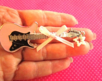 Pink guitar ribbin hair clip