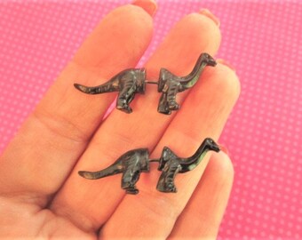 Brontosaurus dinosaur fake plugs