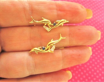 Jumping Dolphin gold ear climbers
