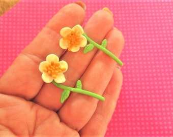 Yellow flower stem ear jackets