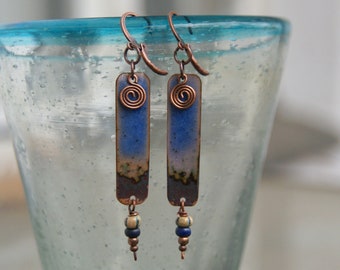 Earrings with handmade enamel charms, earthy glass beads and copper spirals
