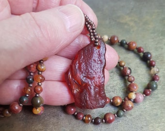 Large reddish amber on a necklace made of Picasso Jasper and Hessonite Garnet, long gemstone necklace, talisman
