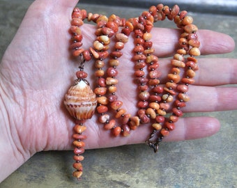 Long coral necklace with handmade porcelain bell, copper beads, old coral beads, long chain