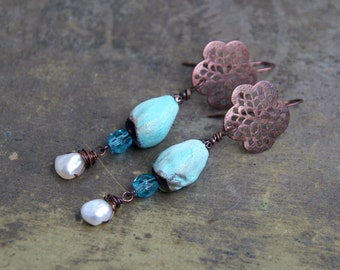 Earrings with handmade ceramic bells, crystal glass beads and fine freshwater pearls on decorated copper ear hooks