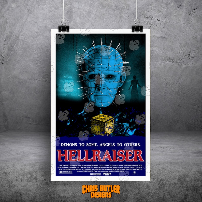 May include: A retro-style poster for the horror film Hellraiser. The poster features a blue and black image of the Cenobite, Pinhead, with a yellow box in the foreground. The text "Demons to some. Angels to others." is above the title "Hellraiser".