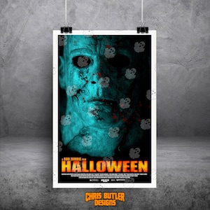 May include: A movie poster for the film "Halloween" directed by Rob Zombie. The poster features a close-up of Michael Myers's face, with a blue and green color scheme and a background of white ghosts.