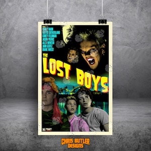May include: A vertical movie poster for The Lost Boys featuring a dark background with yellow text, portraits of the cast, and a night scene with a roller coaster. The poster includes names like Corey Haim, Kiefer Sutherland, and Corey Feldman.