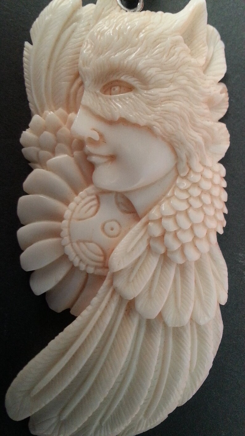 hand-carved unique bovine bone pendant wolf spirit totem animal beautiful angel-like