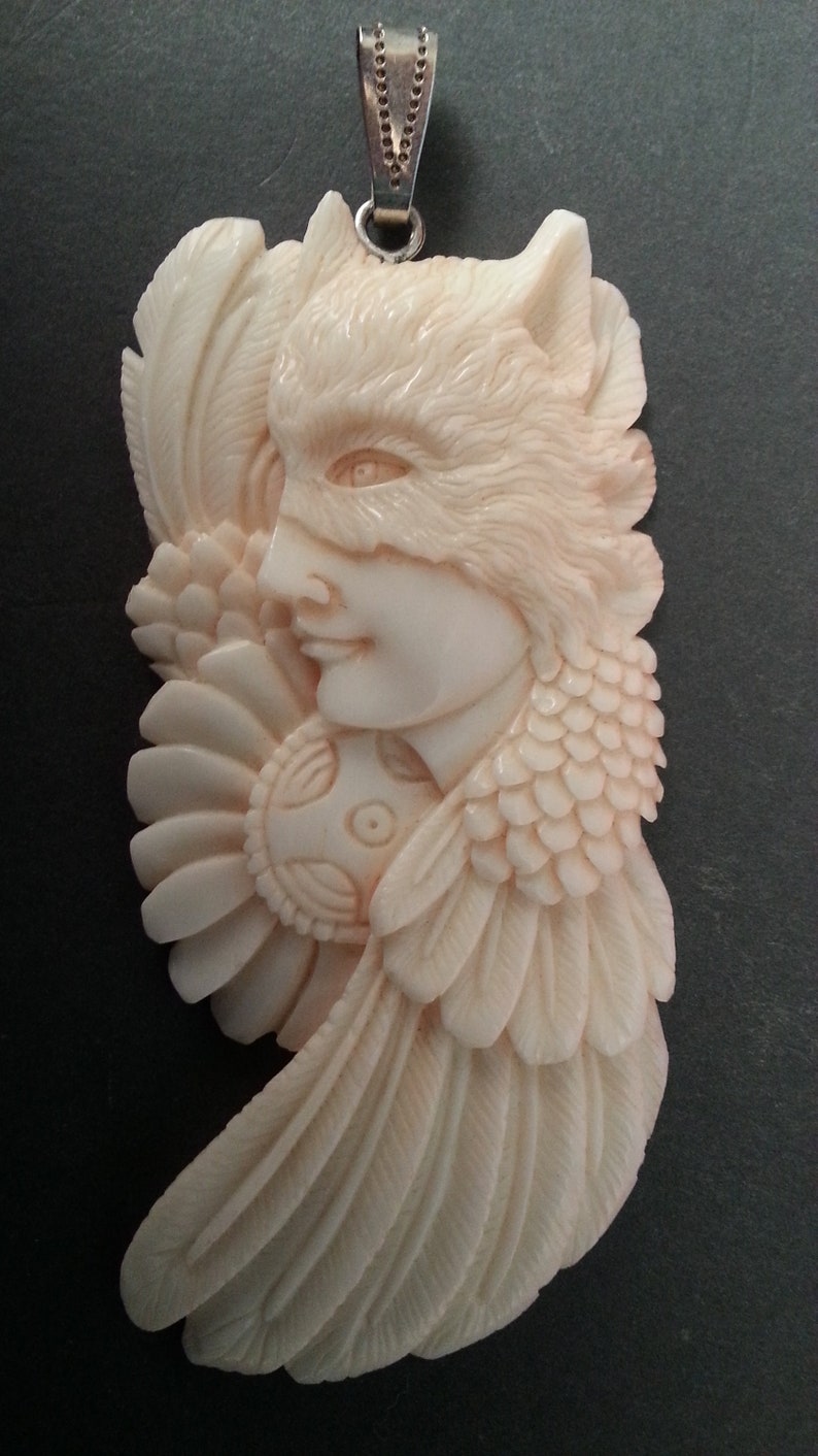 hand-carved unique bovine bone pendant wolf spirit totem animal beautiful angel-like