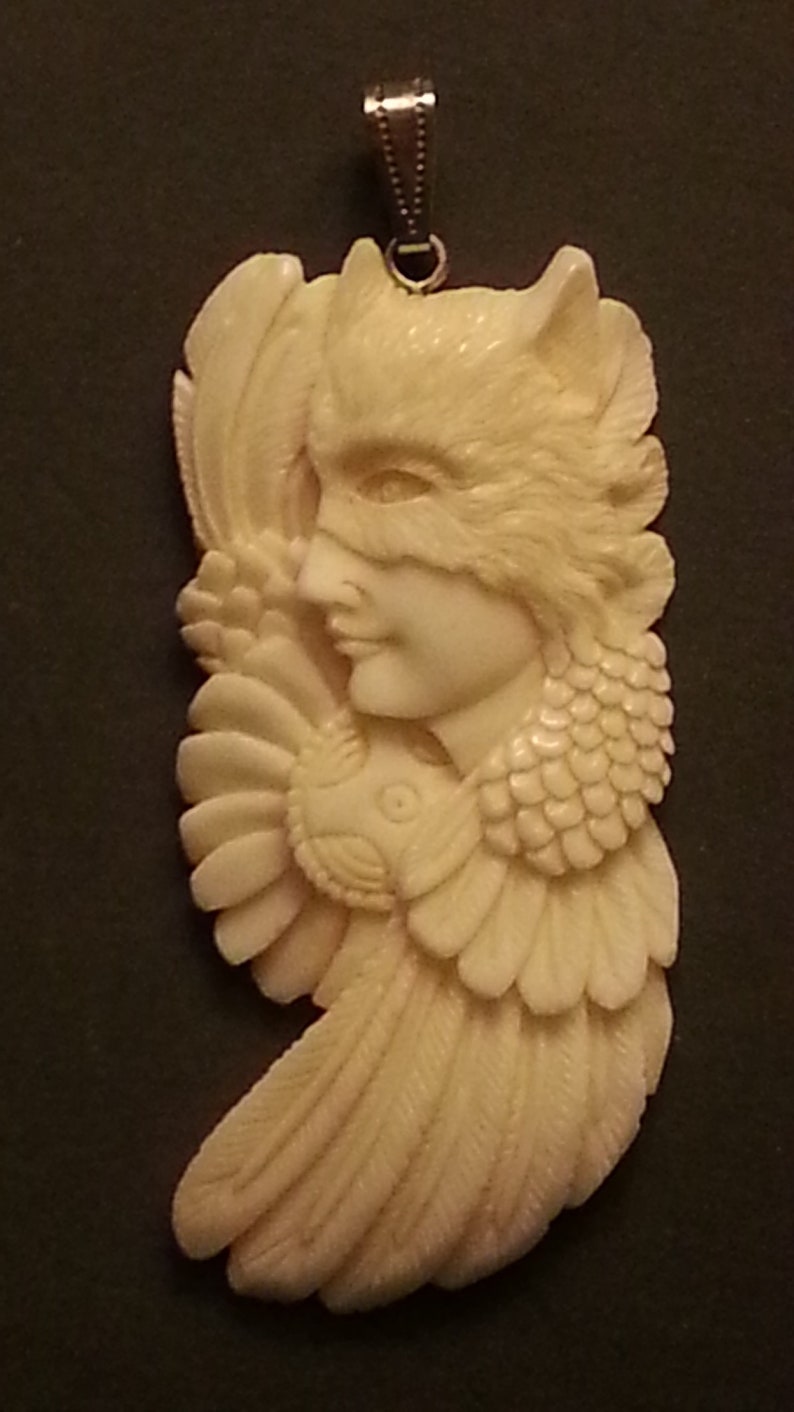 hand-carved unique bovine bone pendant wolf spirit totem animal beautiful angel-like