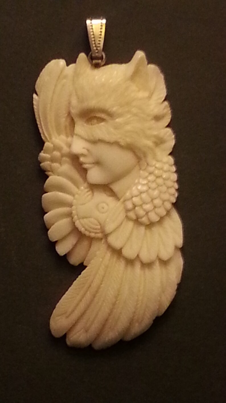 hand-carved unique bovine bone pendant wolf spirit totem animal beautiful angel-like