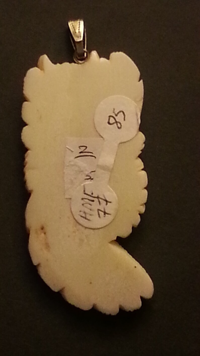 hand-carved unique bovine bone pendant wolf spirit totem animal beautiful angel-like