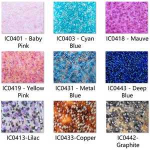 May include: Nine different colors of glitter, each in a square sample. The colors are baby pink, cyan blue, mauve, yellow pink, metal blue, deep blue, lilac, copper, and graphite.