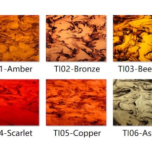 Puede incluir: Seis muestras de chapa de madera de diferentes colores con un patrón de mármol. Los colores son ámbar, bronce, cera de abejas, escarlata, cobre y ceniza.