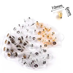 May include: A collection of earring backs in gold, silver, and bronze tones. The earring backs are made of metal and clear plastic. One earring back is measured at 10mm x 6mm. The earring backs are for pierced earrings.