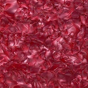 Könnte beinhalten: Nahaufnahme einer strukturierten Oberfläche in tiefroter Farbe. Die Oberfläche besteht aus überlappenden, unregelmäßigen Formen, die einen geschichteten Effekt erzeugen. Die Beleuchtung betont die Textur und Tiefe.