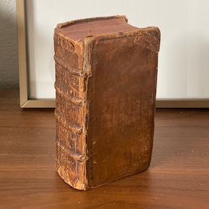 Printed 1665:  A  Puritan Bible with American Interest